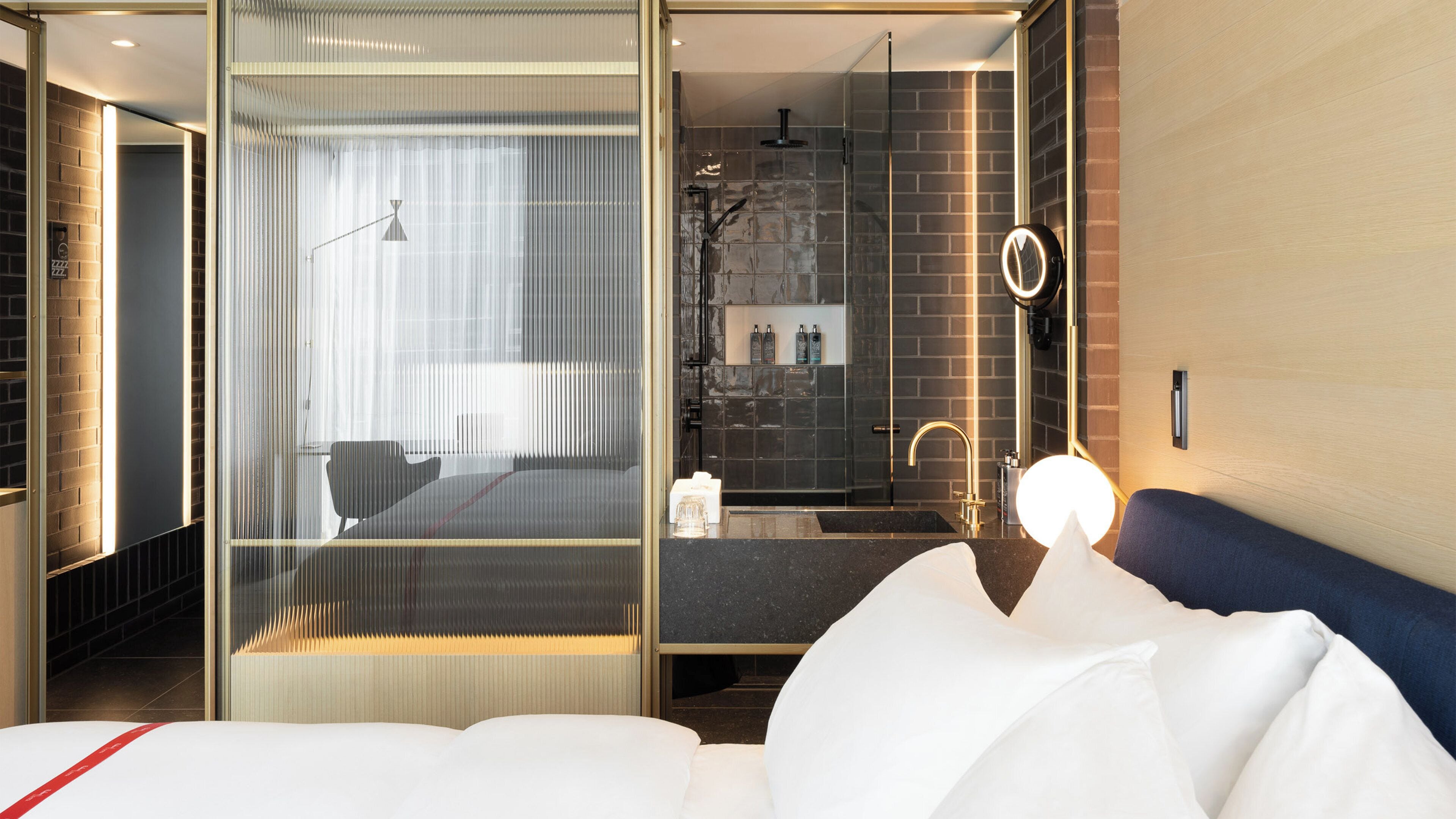 Designer toiletries, hair dryer, towels