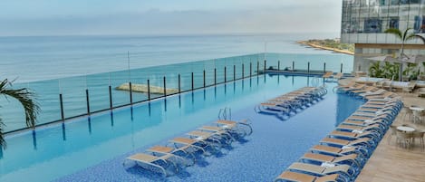 Outdoor pool, sun loungers