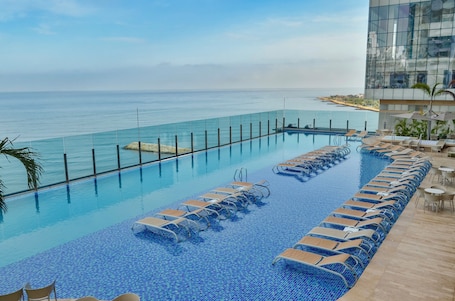 Outdoor pool, sun loungers