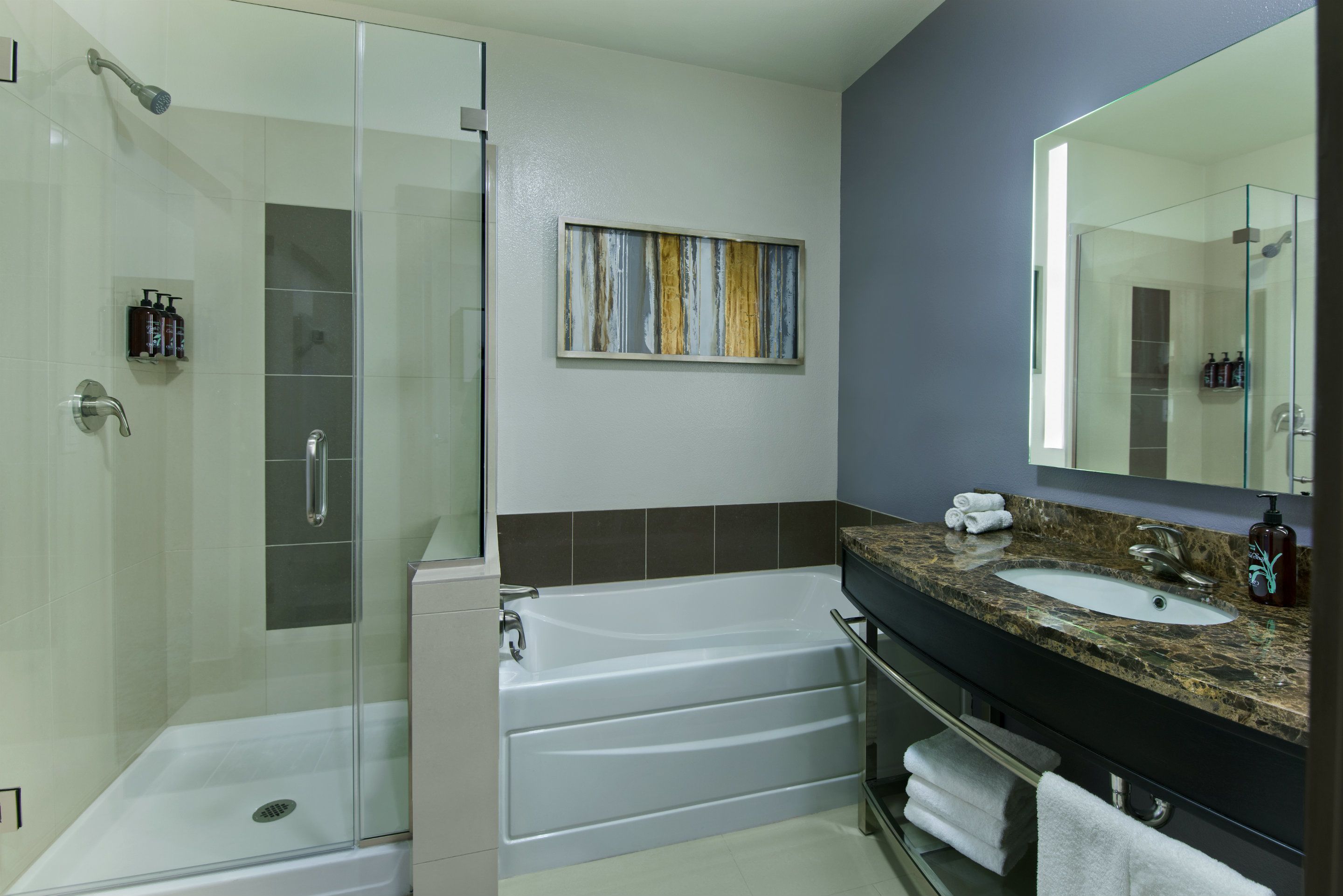 separate bathtub and shower, eco-friendly toiletries, hair dryer, towels