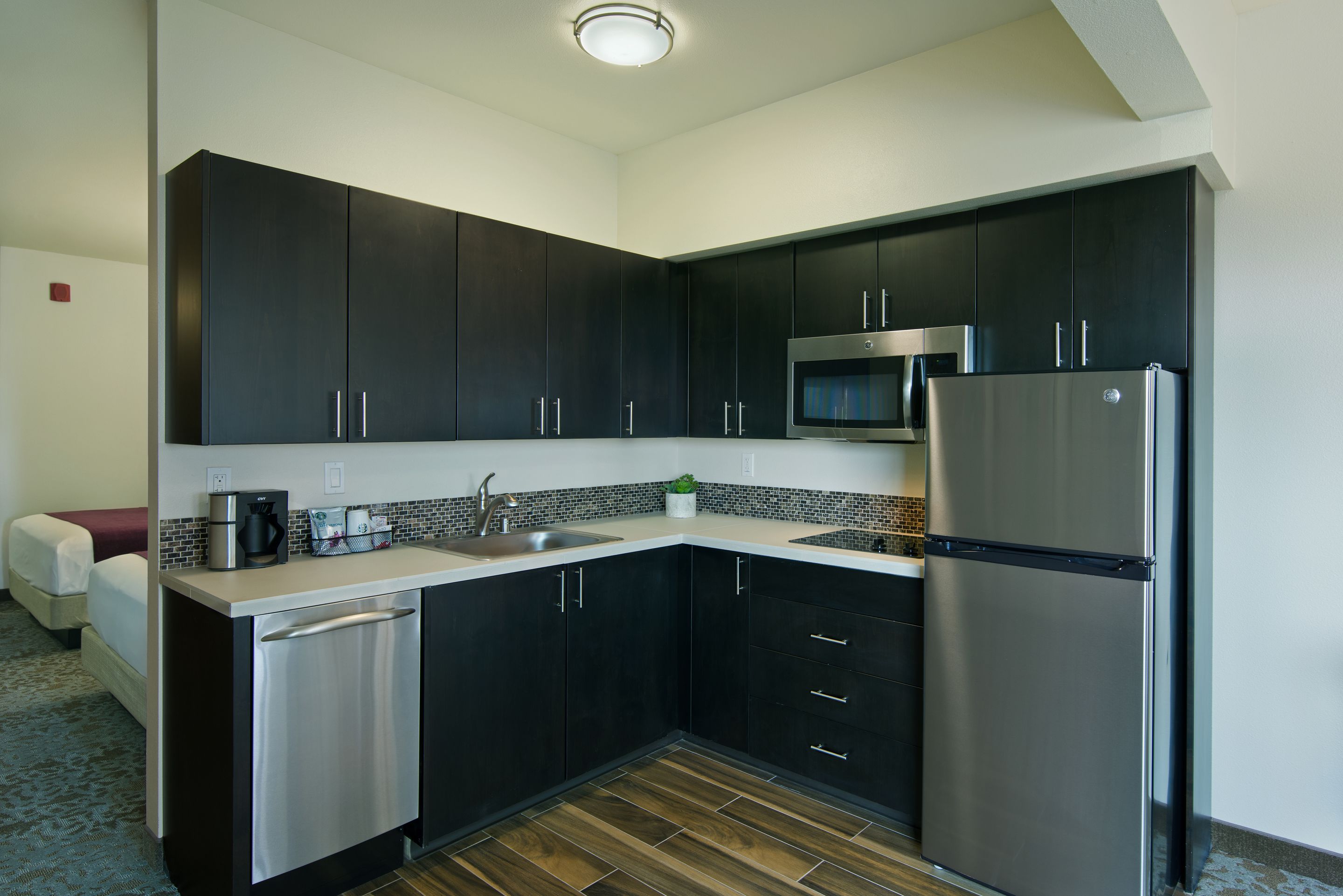 extended stay balcony 2 queen suite kitchenette | private kitchen | fridge, microwave, coffee/tea maker