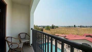 Balcony 2 Queen Suite | In-room safe, desk, laptop workspace, blackout drapes