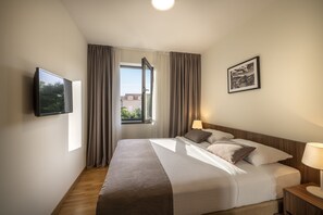 Premium Apartment, 1 Bedroom | 1 bedroom, in-room safe, desk, blackout drapes