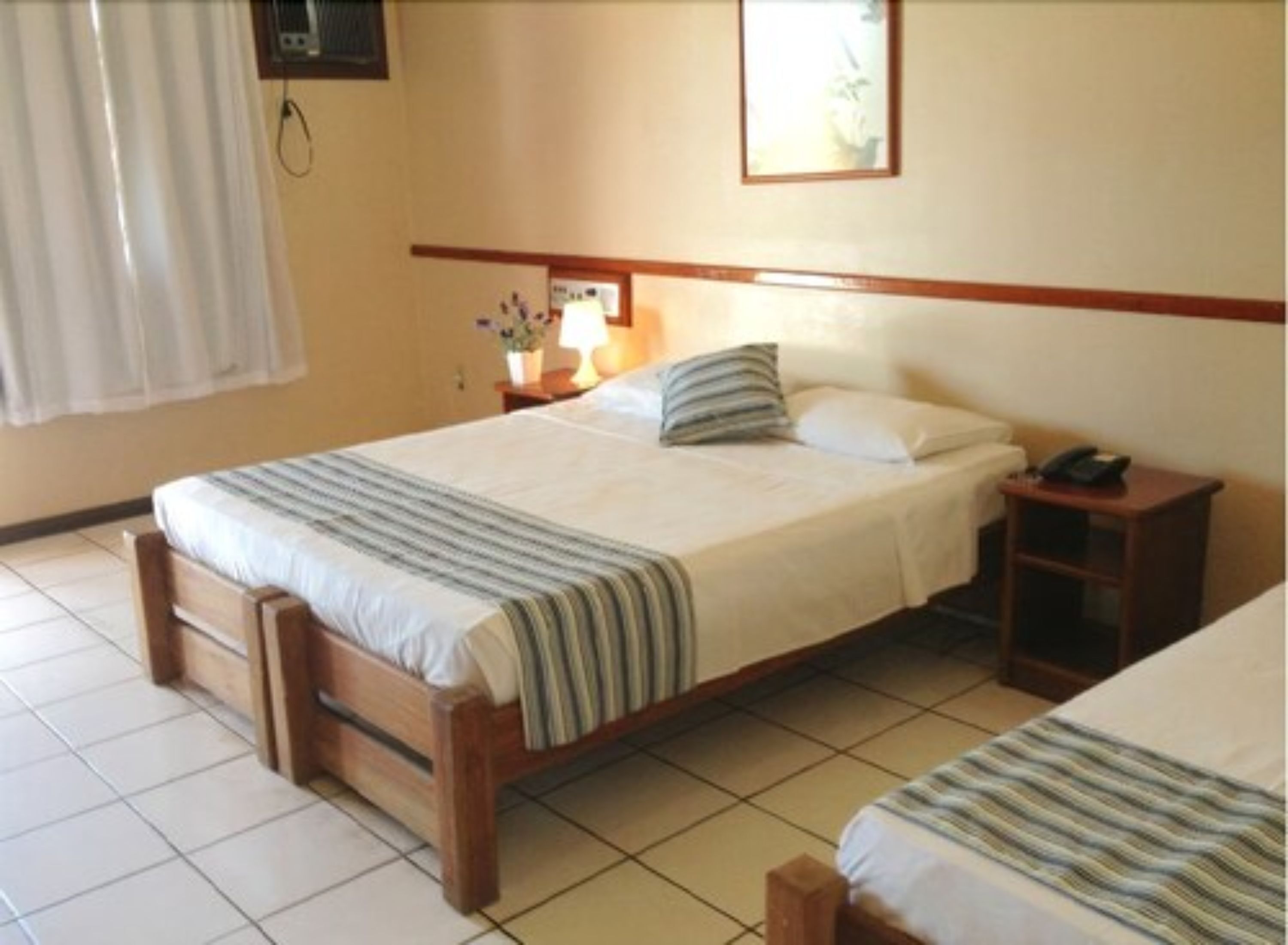 standard room | in-room safe, individually decorated, desk, blackout curtains