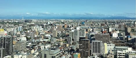 A densely packed urban area with numerous high-rise buildings, likely a cityscape.