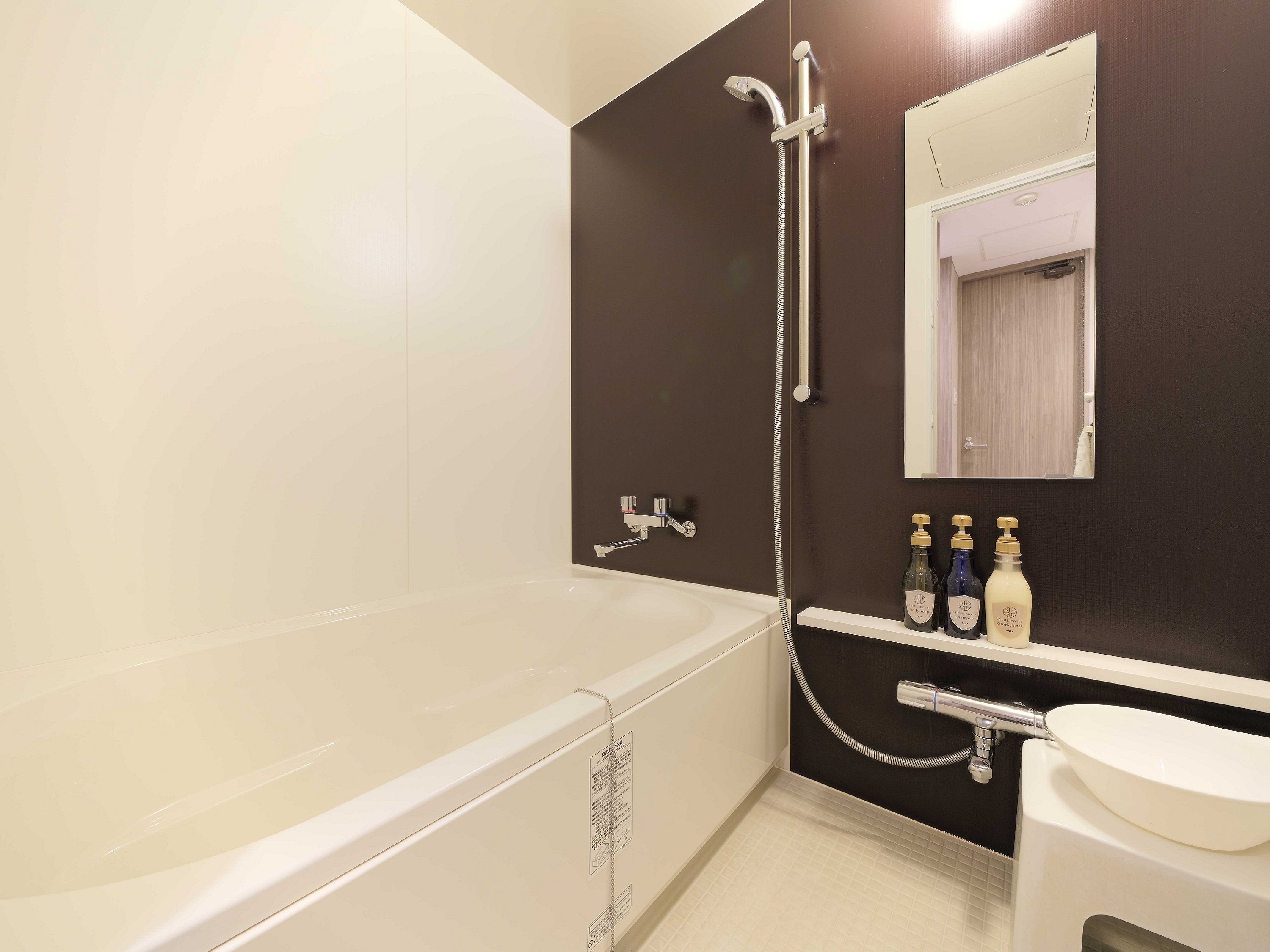 separate bathtub and shower, free toiletries, hair dryer, slippers