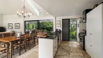 Ngahere Three-Bedroom Villa with Private Pool | Private kitchen | Full-size fridge, microwave, oven, stovetop