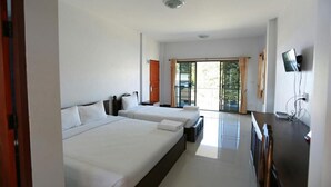 A hotel room with two beds, a TV, and a sliding glass door leading to a balcony. - Tararin (Chiang Saen)