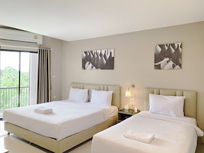 Family Room | Minibar, desk, free WiFi - The Coconut Hotel (Lampang)
