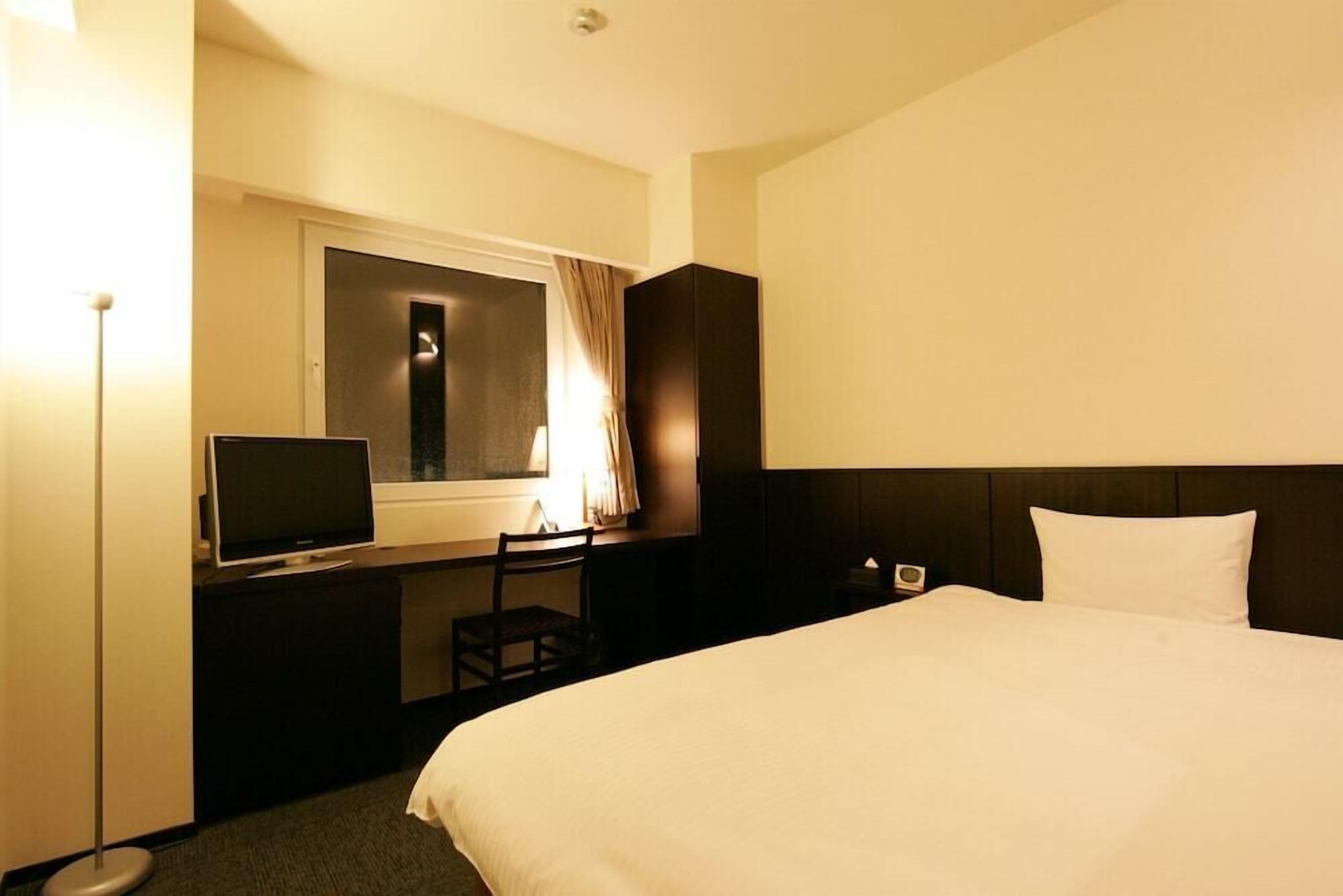 Desk, blackout curtains, free WiFi, bed sheets