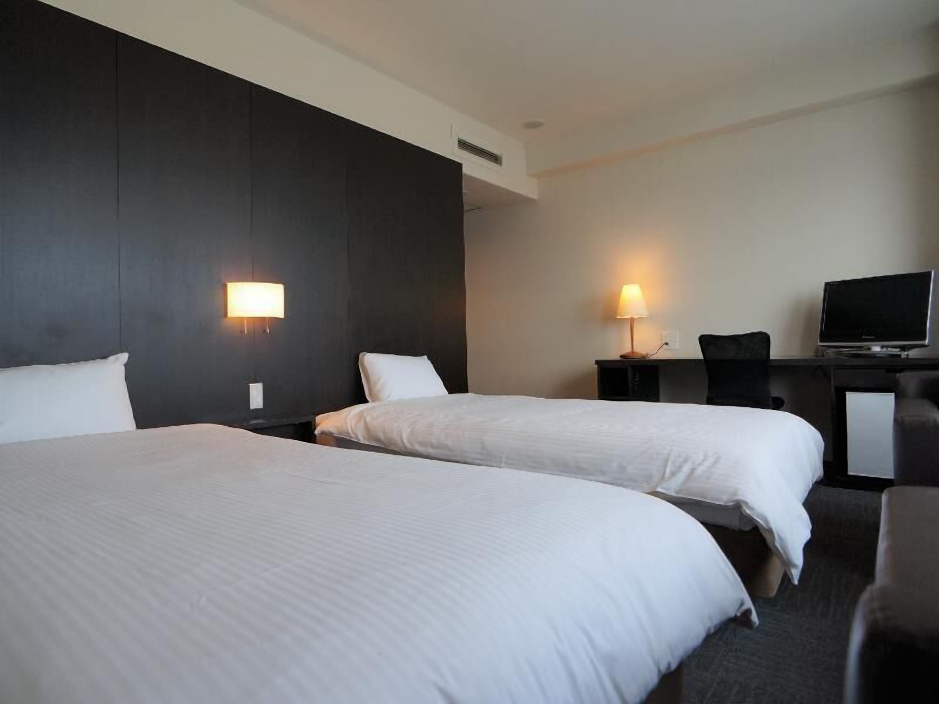 Desk, blackout drapes, free WiFi, bed sheets