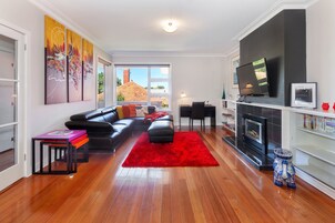 Webster St Two Bedroom Apartment First Floor | Living area | Flat-screen TV, fireplace, pay movies