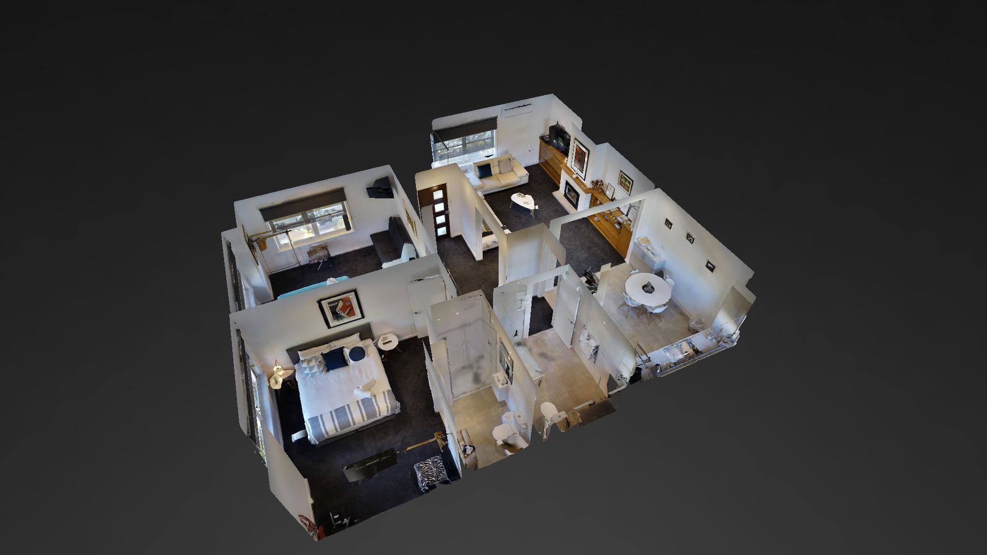 Modello tridimensionale di una camera d'hotel con un letto, comodino, armadio e un piccolo angolo salotto con una sedia e un tavolo.