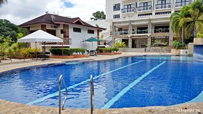 3 outdoor pools, open 7:00 AM to 8:00 PM, pool umbrellas, sun loungers - Bravo Hotel and Resorts (Sibulan)