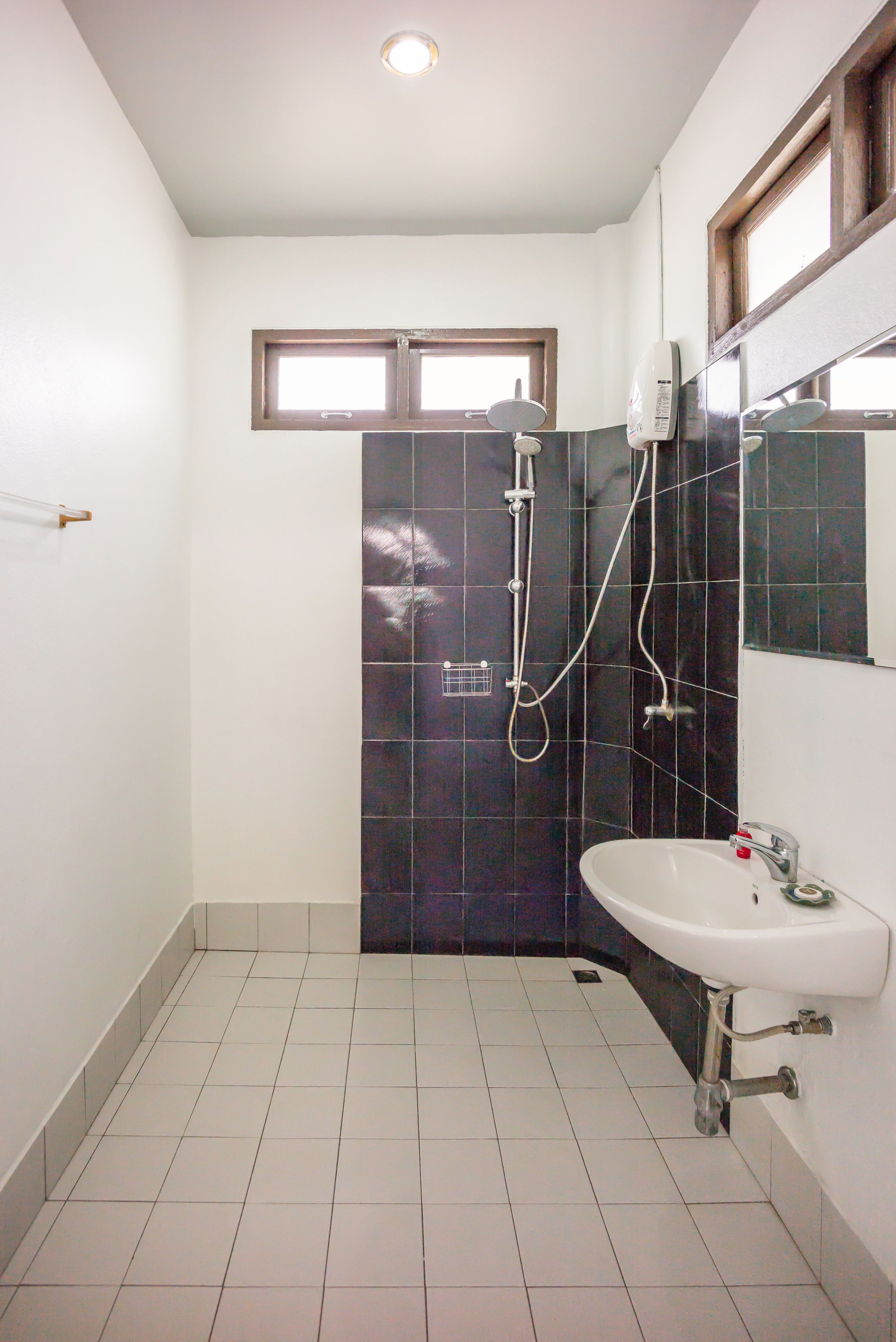 deluxe bungalow, 1 king bed, patio, beachfront | bathroom | shower, free toiletries, towels, soap