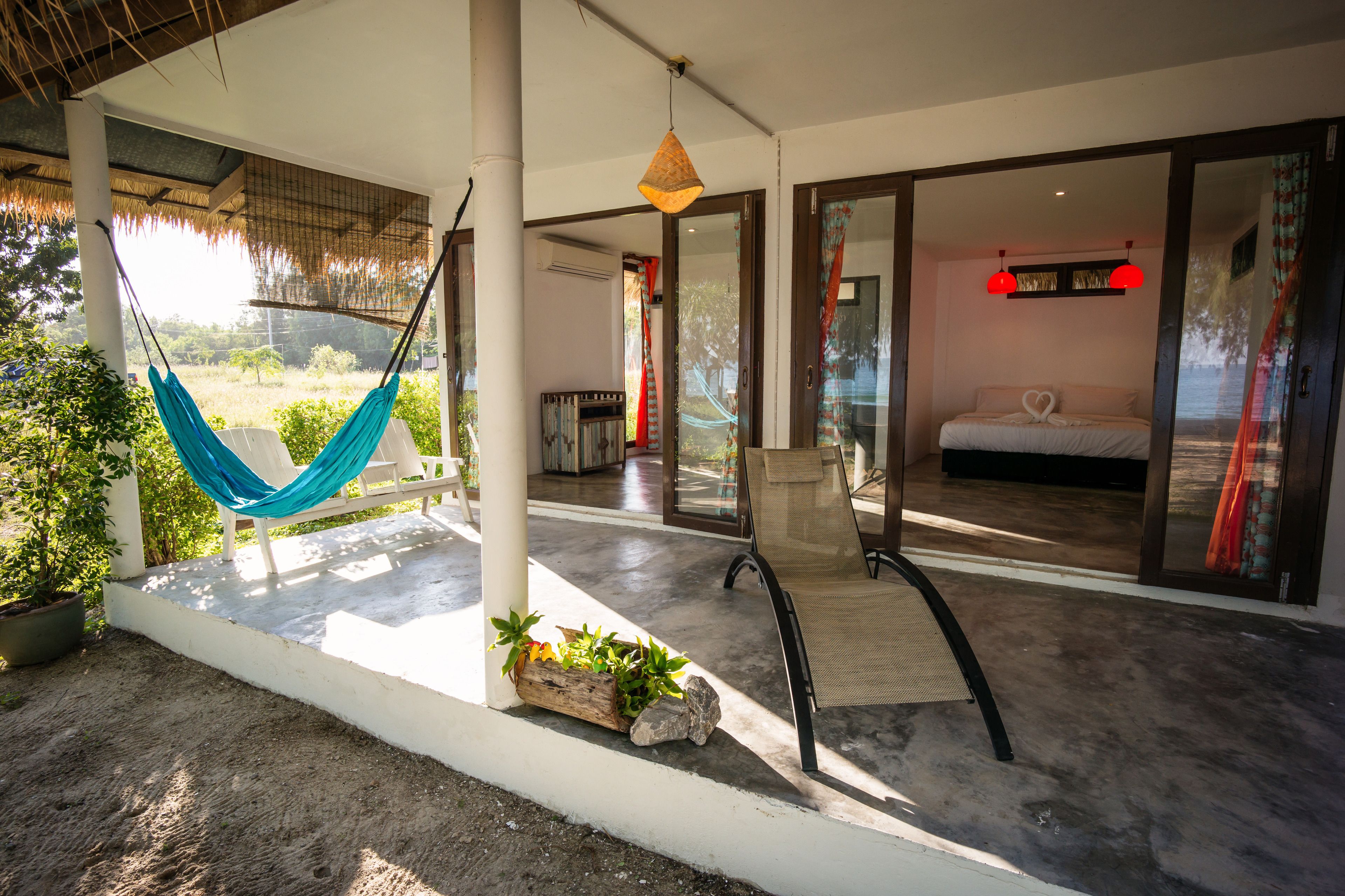 deluxe bungalow, 1 king bed, patio, beachfront | terrace/patio