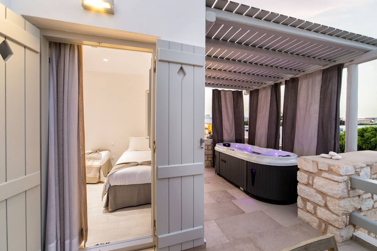 superior suite, 2 bedrooms, jetted tub | terrace/patio