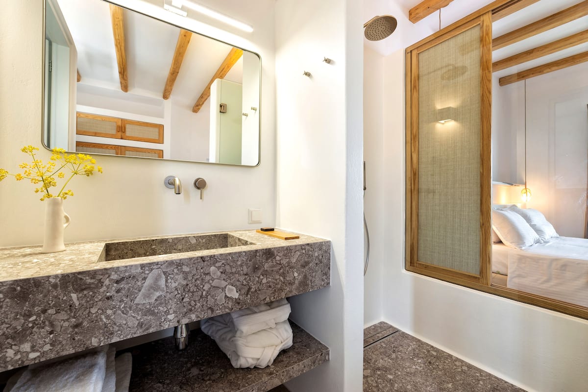 superior double or twin room, jetted tub | bathroom | shower, rainfall showerhead, designer toiletries, hair dryer