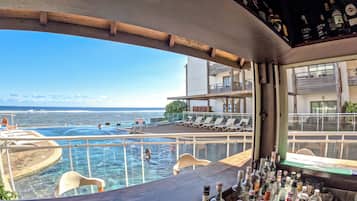 Outdoor pool, open 8:00 AM to 8:00 PM, sun loungers
