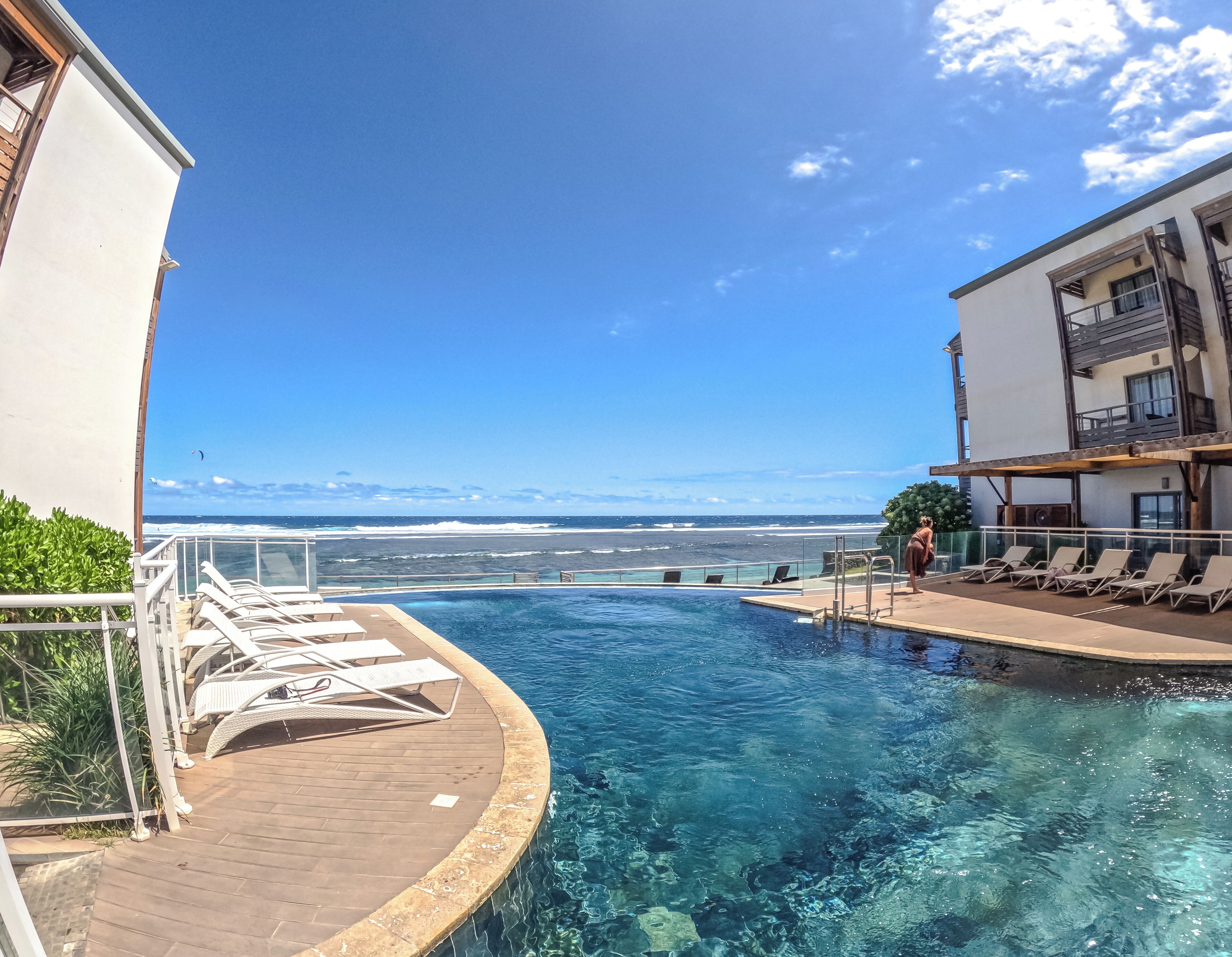 outdoor pool, open 8:00 am to 8:00 pm, pool loungers