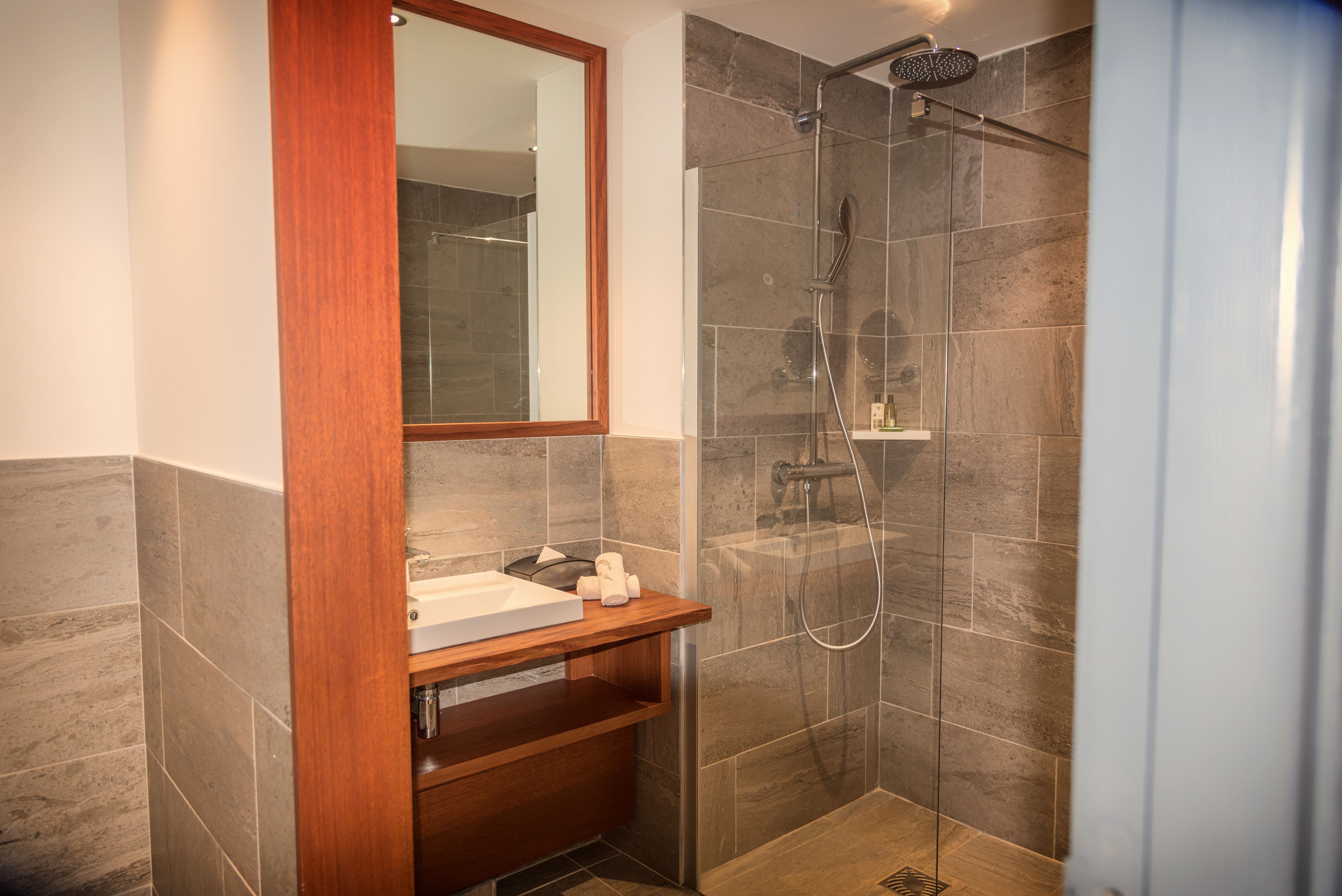 luxury triple room, pool view | bathroom | shower, free toiletries, hair dryer, towels