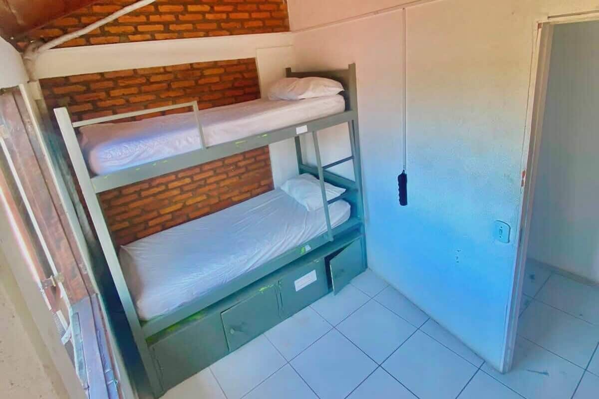 Double Dorm, Shared Bathroom | Blackout drapes, WiFi (free), bed sheets