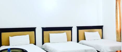 Economy Triple Room | In-room safe, desk, free WiFi