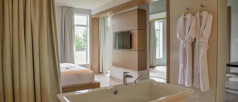 Executive Suite, 1 King Bed with Sofa bed, Golf View | Bathroom | Hair dryer, towels