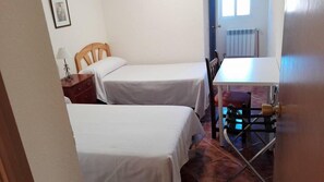 Chambre Double ou avec lits jumeaux | Rideaux occultants, lits pliants/supplémentaires