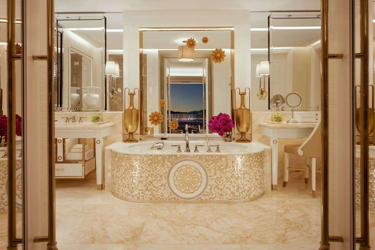 parlor suite | bathroom | separate bathtub and shower, designer toiletries, hair dryer, bathrobes