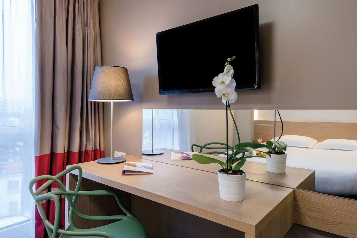 Desk, laptop workspace, iron/ironing board (on request), WiFi (free)