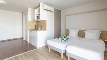 Superior Studio, 2 Twin Beds | 1 bedroom, desk, laptop workspace, iron/ironing board