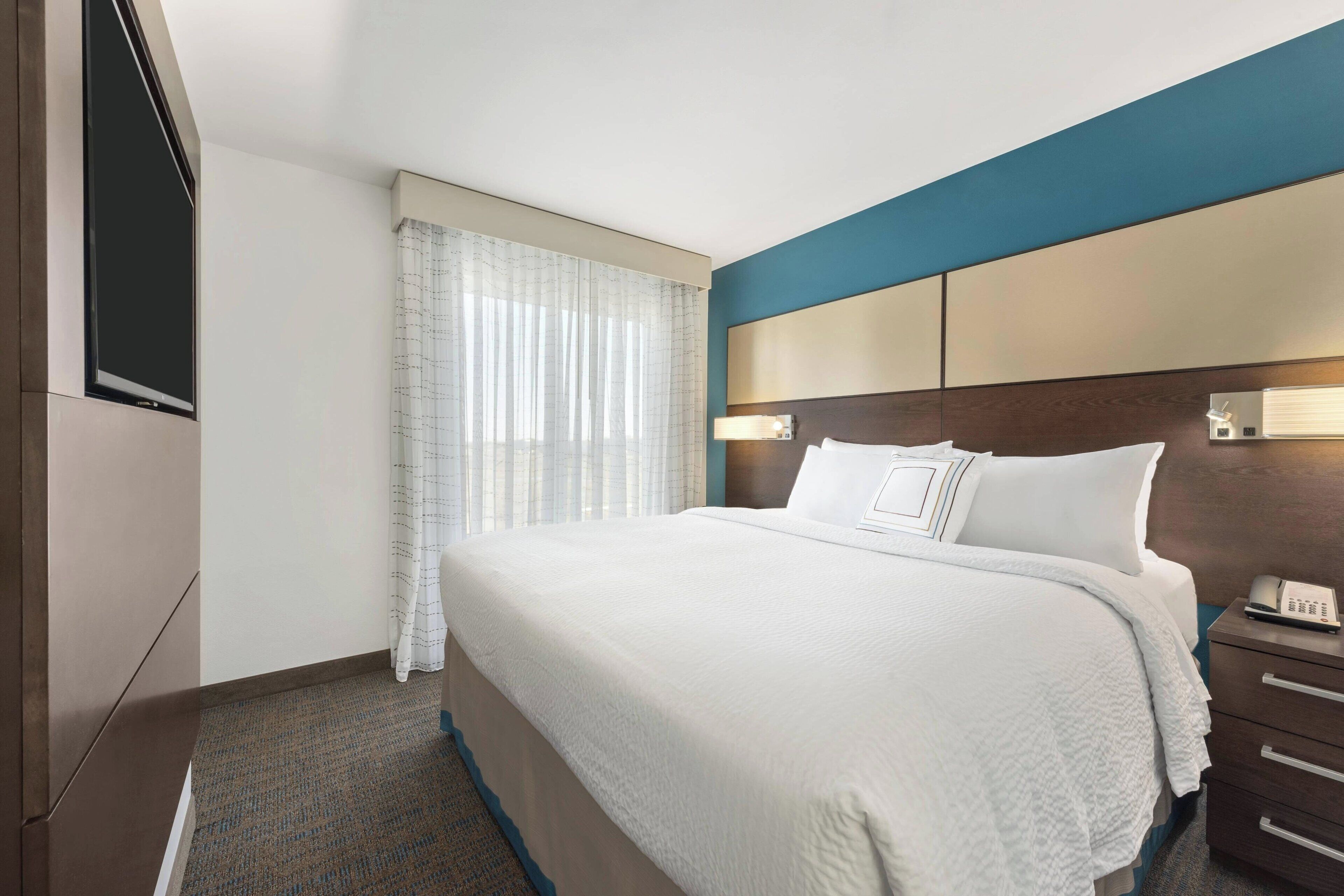 suite, 2 bedrooms | in-room safe, desk, laptop workspace, iron/ironing board