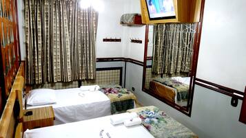 Frigobar, escrivaninha, cortinas blackout, Wi-Fi de cortesia