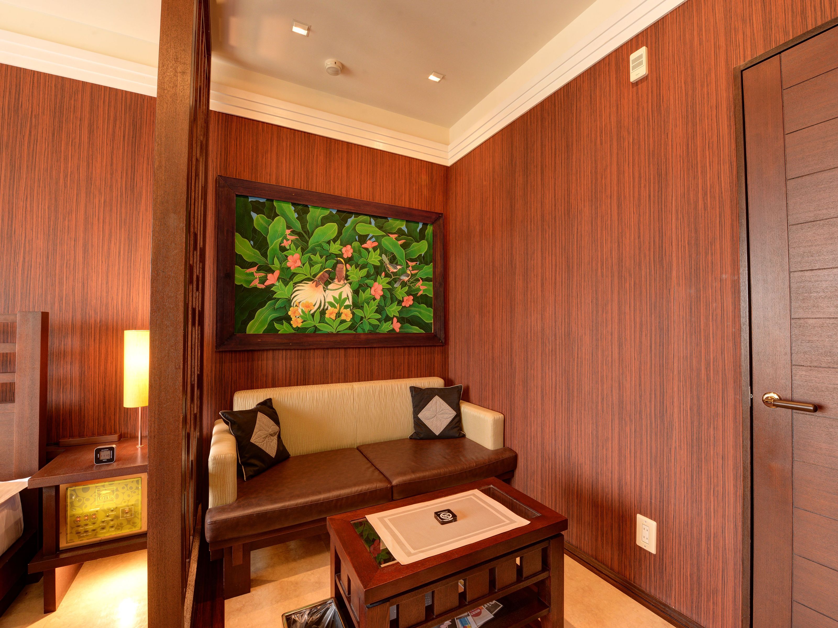 standard double room, 1 queen bed, smoking, private bathroom | living area | 50-inch tv with premium tv channels