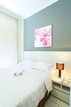 Premium bedding, down comforters, desk, blackout drapes