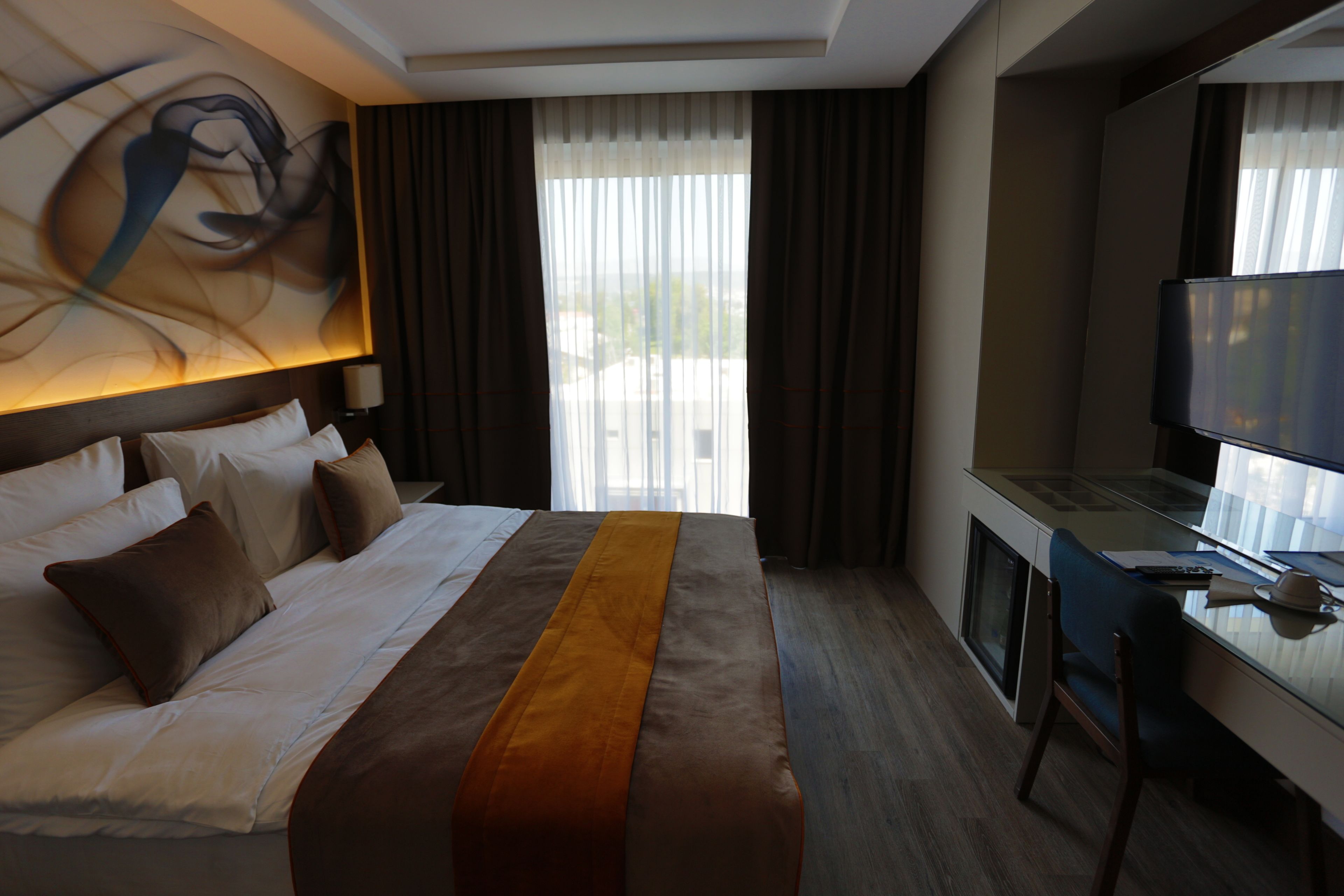 deluxe standard room | premium bedding, minibar, in-room safe, soundproofing