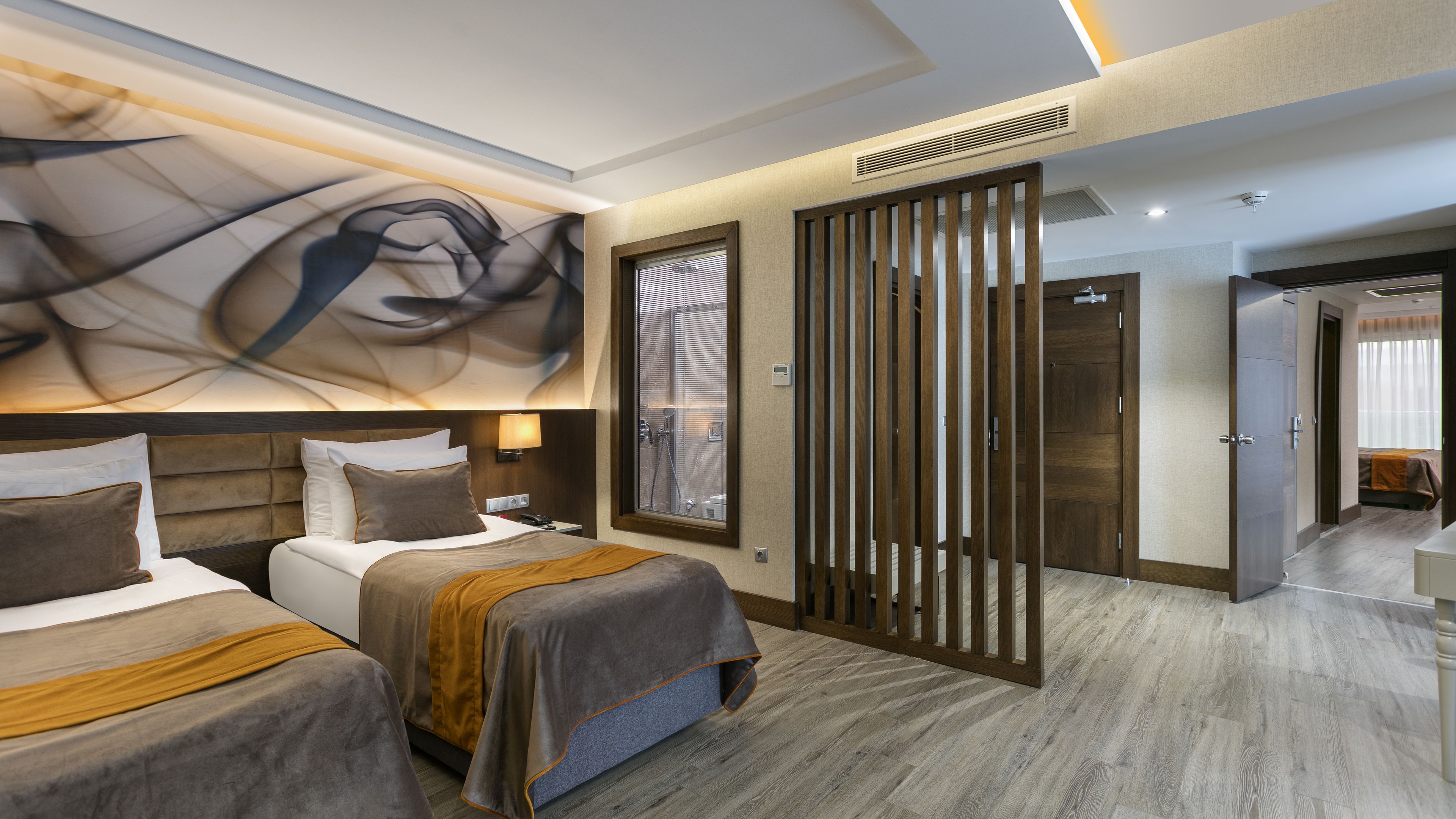 family room | premium bedding, minibar, in-room safe, soundproofing