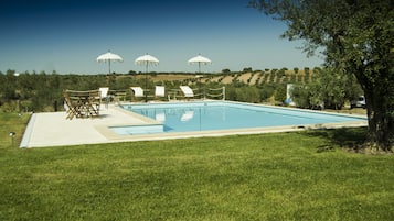 Seasonal outdoor pool, open 9 AM to 8 PM, pool umbrellas, sun loungers