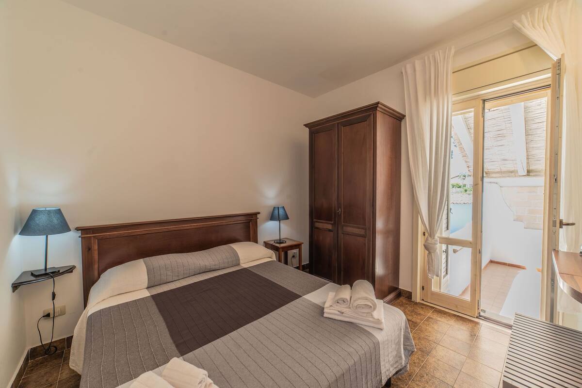 Appartamento con una camera da letto | Tabla de planchar con plancha, wifi gratis, ropa de cama