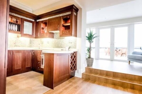 Panoramic Penthouse, 2 Bedrooms, Terrace, Partial Sea View | Private kitchen | Full-sized fridge, microwave, oven, stovetop - Galway Luxury Seaview Apartments (Galway)