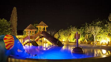 Kids can play safely under the stars in this well-lit outdoor play area.