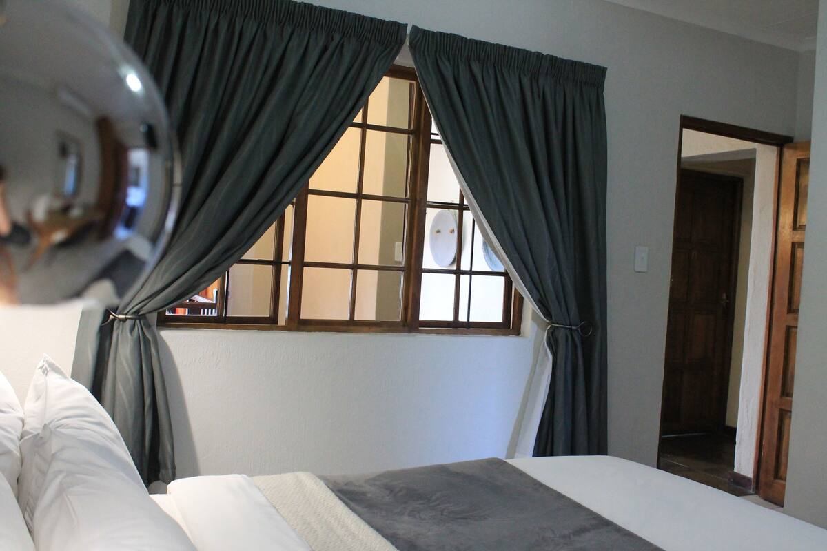 standard double room | in-room safe, individually decorated, desk, blackout curtains