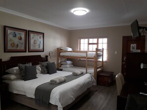 Family Room, 1 Bedroom (King Room) | Desk, free WiFi, bed sheets