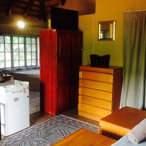 Habitación de lujo | Sala de estar | Una televisión