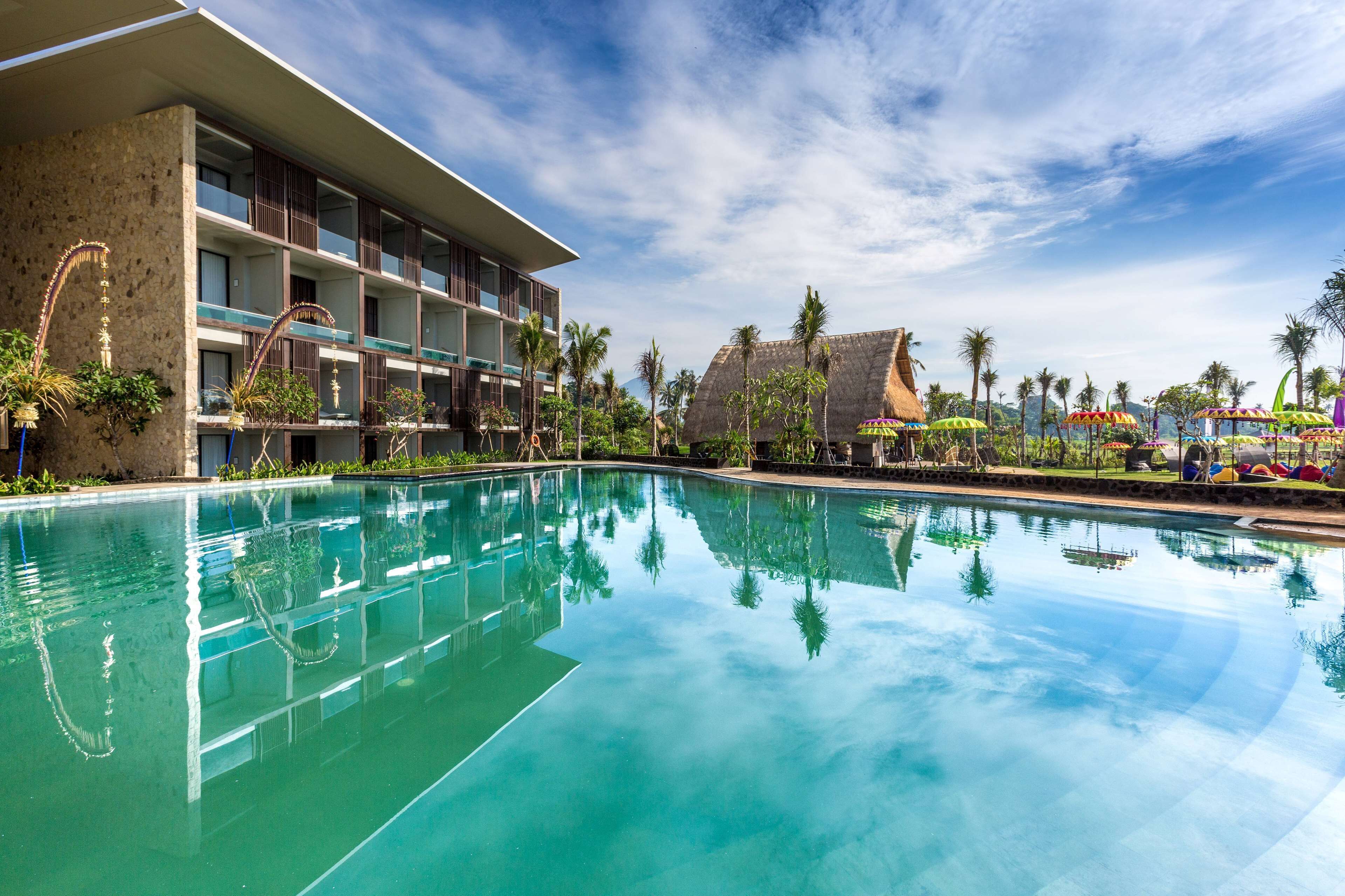 2 outdoor pools, open 9:00 AM to 7:30 PM, pool umbrellas, pool loungers