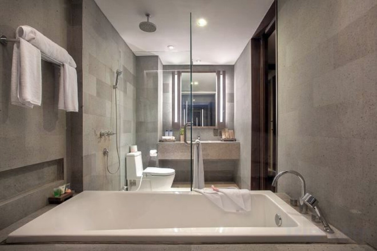 Designer toiletries, hair dryer, bathrobes, slippers