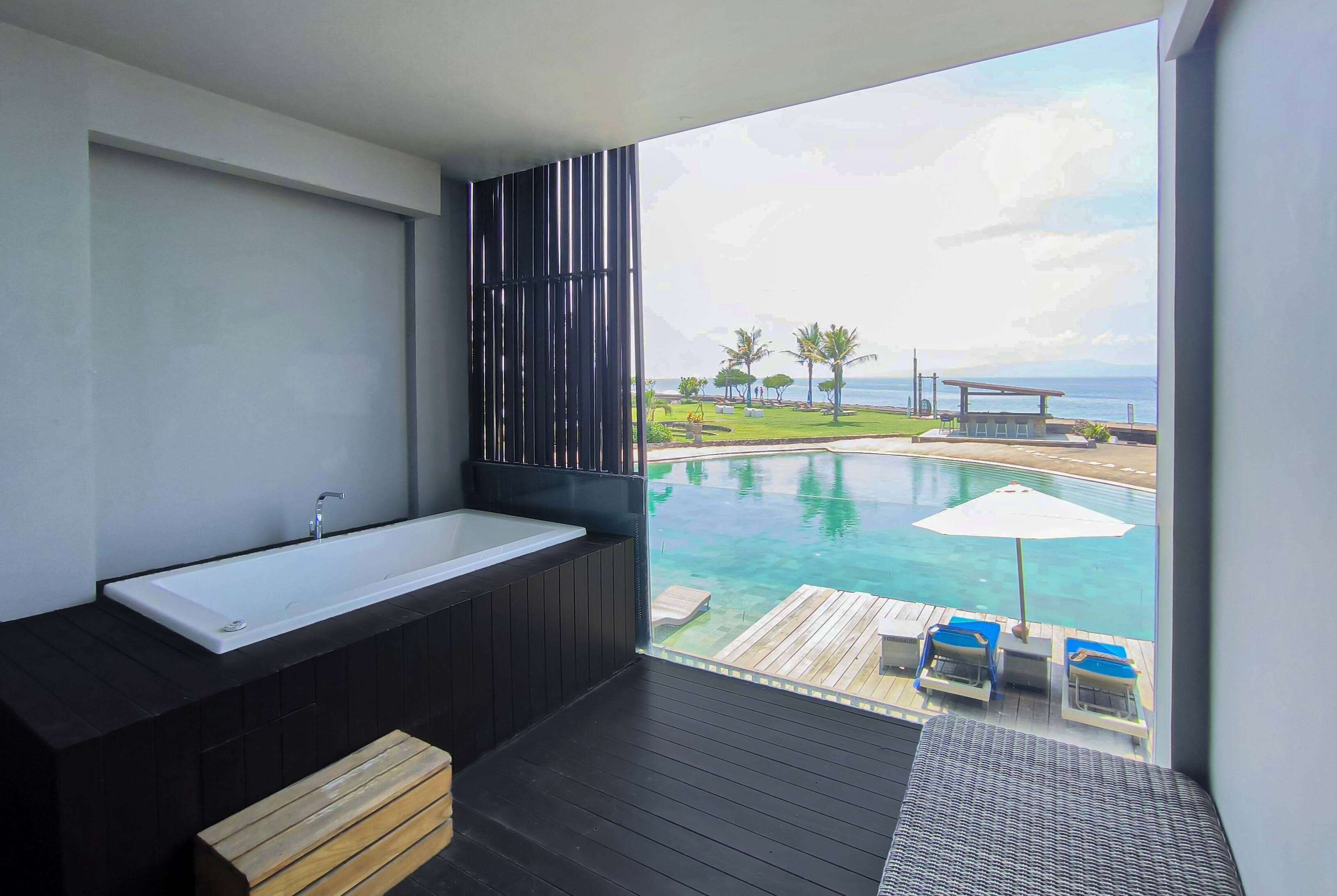 designer toiletries, hair dryer, bathrobes, slippers