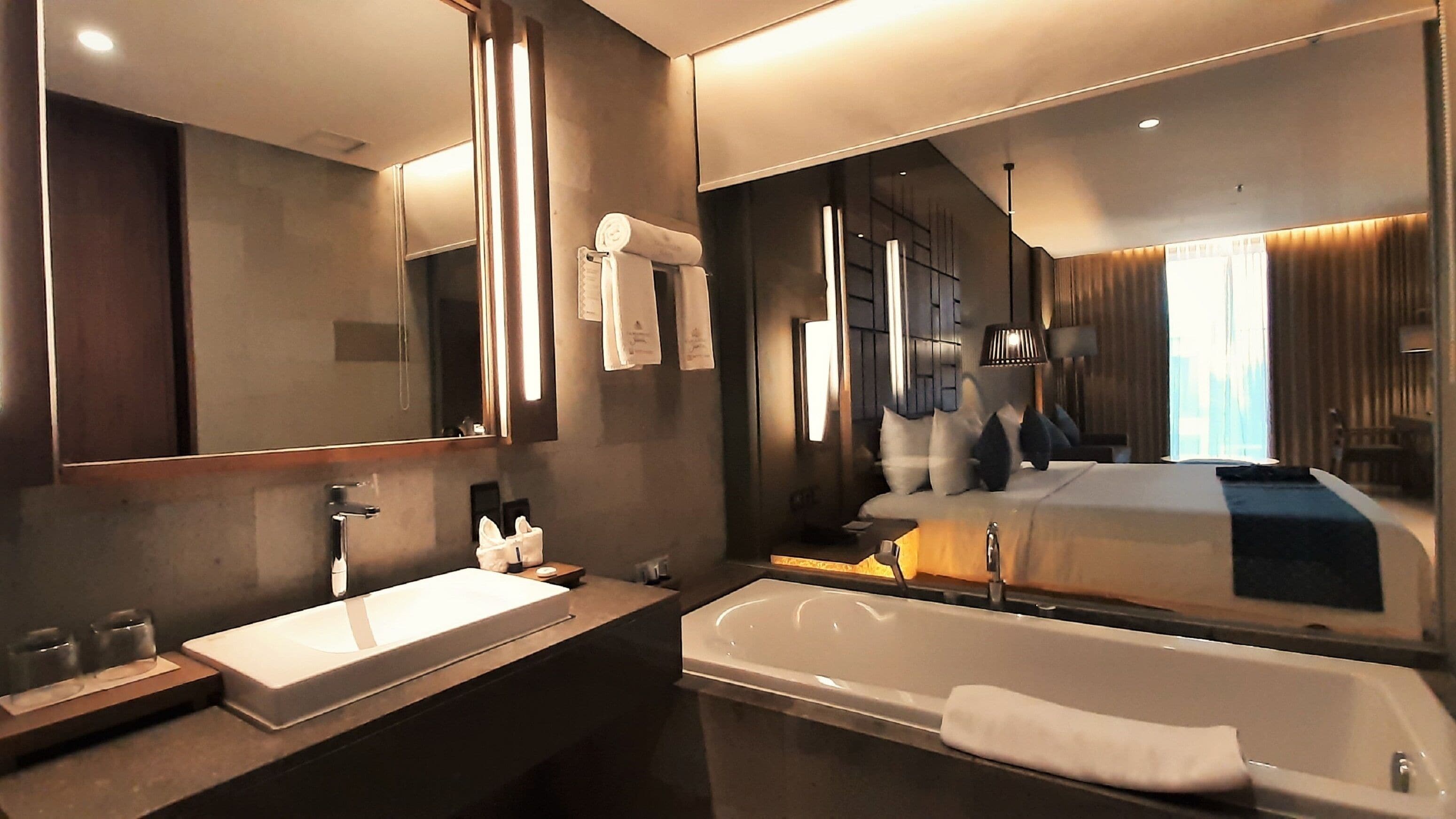 designer toiletries, hair dryer, bathrobes, slippers