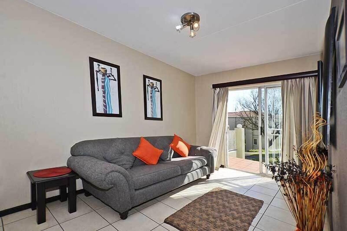 Apartment (One B) | Living area | 32-inch flat-screen TV with digital channels, TV